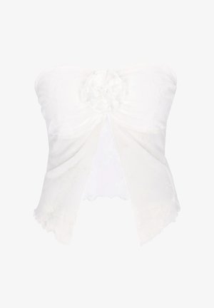 Top alb fără bretele, cu panouri din material transparent și un detaliu floral texturat în partea din față, în centru.
