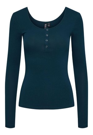 Tumman teal-värinen pitkähihainen paita, jossa on ribbitekstuuri, pyöreä pääntie ja viisipaikkainen nappilista. Tiukka malli, jossa on sileä pinta.