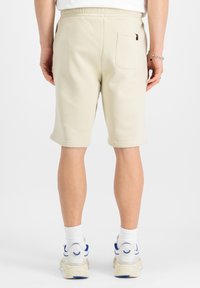 Alpha Industries BASIC SMALL LOGO - Pantaloni sportivi - vintage white