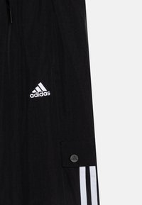 adidas Performance JAM PANT JUNIOR UNISEX - Auduma bikses - black/white