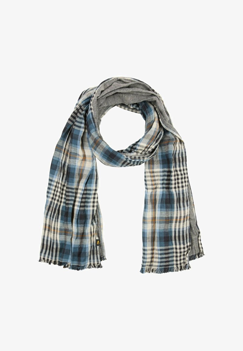 Écharpe à carreaux présentant des nuances de bleu, gris et blanc avec des extrémités effilochées. Fabriquée en tissu léger, elle a une finition douce et texturée.