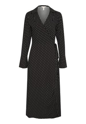 Zwarte wikkeljurk met lange mouwen en witte stippen, voorzien van een V-hals en een strik taille. Glad stoftextuur.