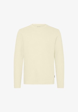 Lichtcrème lange mouw shirt met een ronde hals, textuur stof, en een klein logo op de borst. Eenvoudig ontwerp zonder patronen of accenten.