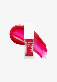 Huile à lèvres rouge dans un flacon en verre transparent avec un capuchon blanc. Une éclaboussure rose vibrante du produit s'étend à côté, mettant en avant une finition brillante.