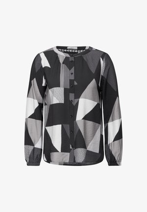 Chemise à manches longues avec des motifs géométriques noirs, blancs et gris, présentant un col rond, une fermeture à boutons à l'avant et des épaules froncées. Matière douce et légère.