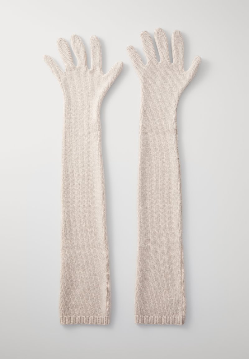 Long, pale pink knitted gloves with a textured finish and fitted wrist openings, designed to cover arms above the elbow.