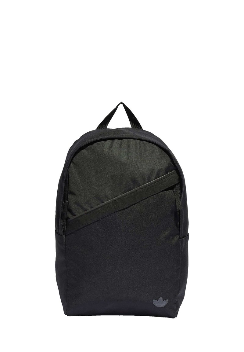 Black fabric backpack with a rounded shape, front zip pocket, and top handle. Features a subtle logo in the lower corner. Textured surface.