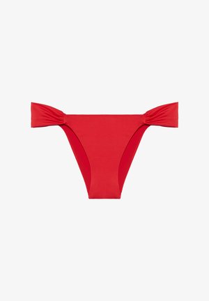 Red bikini bottom featuring bow accents on each side, seamless design, and smooth texture. High-cut leg openings enhance silhouette.