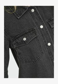 Sélectionné, washed black