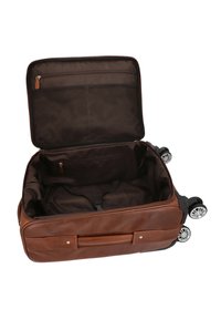 Brun lædersuitecase med dobbelthjul, lynlås og indvendig netlomme. Har justerbare stropper til sikker pakning. Indersiden er mørkebrun.