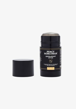 Deodorante in stick nero con design a rotazione, dotato di un cappuccio in plastica trasparente. L'etichetta include il nome del marchio e i dettagli del prodotto in testo dorato e bianco.
