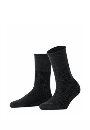 Paar schwarze, strukturierte Socken bis zur Mitte der Wade mit verstärkten Zehen und Fersen, vor weißem Hintergrund dargestellt.