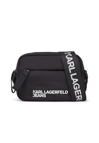 Geantă crossbody din nylon negru, cu curea ajustabilă. Prezentă logo-ul alb "KARL LAGERFELD JEANS", formă rectangulară și închidere cu fermoar.