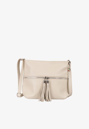 Beige leather crossbody bag with adjustable strap, front horizontal zipper, and two matching tassels hanging from zipper pulls.