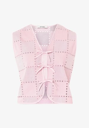 Vaaleanpunainen hihaton liivi, jossa on neliönmuotoinen silmäkuvio ja kolme etupuolen solmittavaa kiinnitystä, merkiltään Ivy Oak.