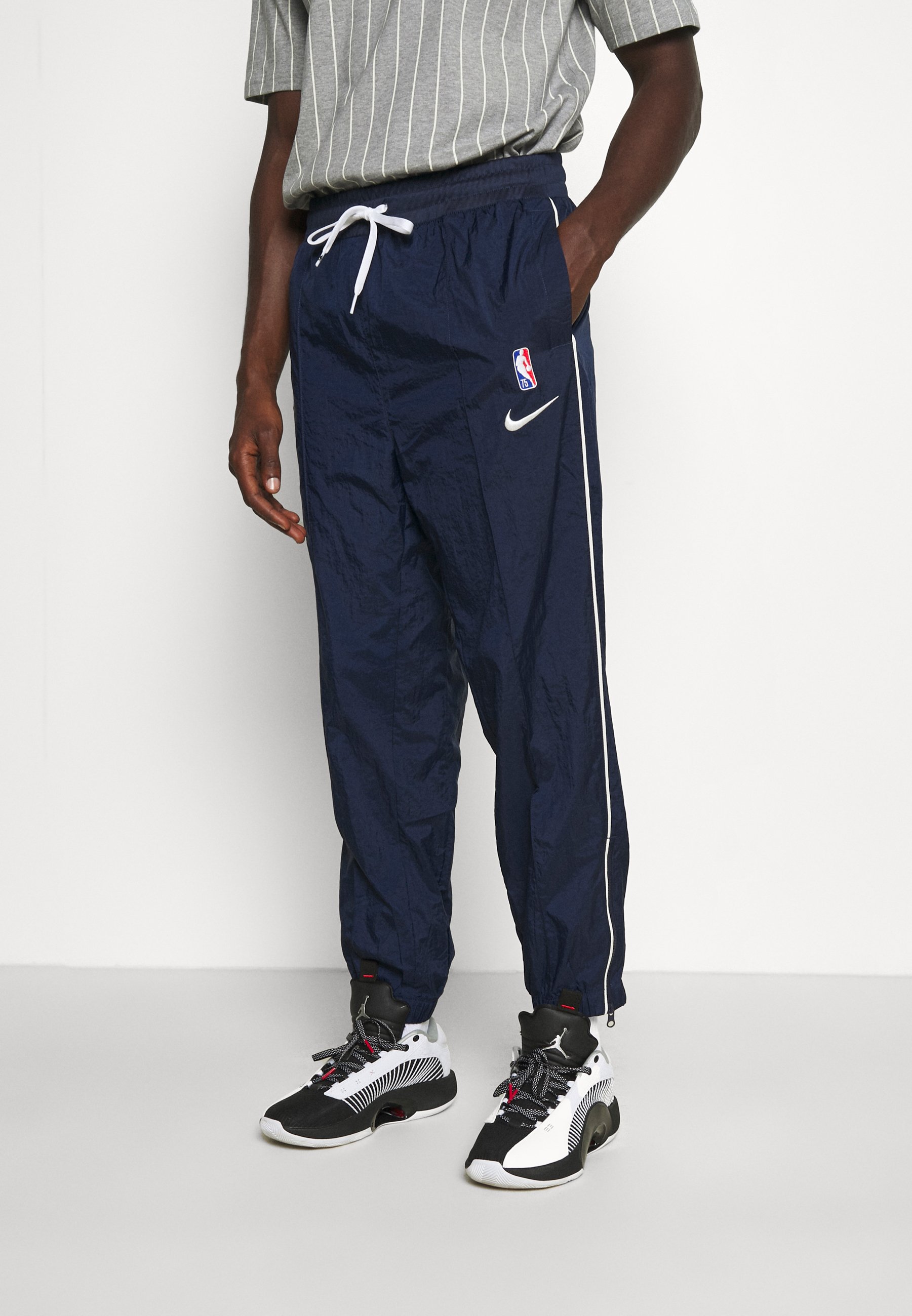 nike navy tape tracksuit