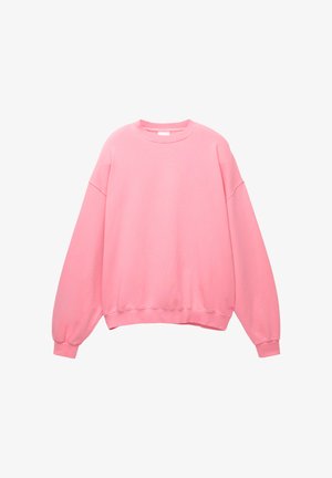 Roze oversized sweatshirt met een ronde hals, verlaagde schouders, lange mouwen en ribgebreide boorden en onderrand. Gemaakt van zachte, gestructureerde stof.
