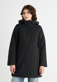 Mustat vedenpitävät parka, jossa on huppu, suora leikkaus, vetoketjulliset sivutaskut ja sileä pinta, joka sopii kylmään säähän.