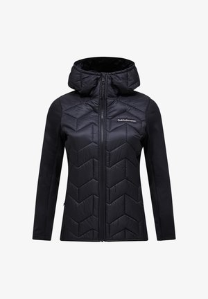 Sort isoleret jakke med quiltet chevronmønster, fuld lynlås foran, fasthætte hætte og "Peak Performance"-logo på brystet.