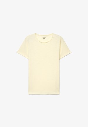 Maglietta in cotone color crema a maniche corte con scollo rotondo, taglia XL, distesa su uno sfondo bianco.