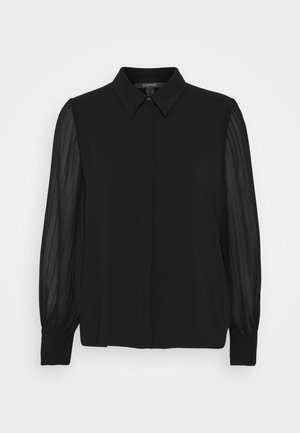 Sort langærmet bluse med gennemsigtige stribede ærmer, knapmanchetter, spids krave og skjulte knapper foran, af Esprit.
