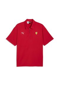 Polo rouge en tissu lisse, avec un col zippé, logo Puma blanc et emblème Ferrari jaune. Manches courtes et coupe décontractée.