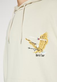 Tommy Jeans Mikina s kapucí - beige
