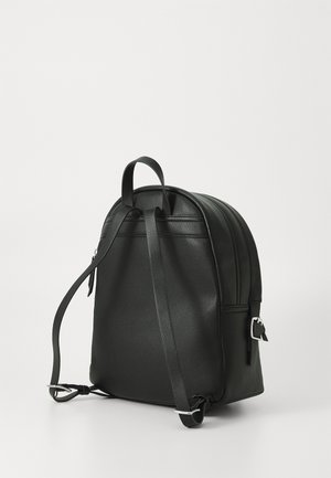Black leather backpack featuring a rounded shape, adjustable straps, top handle, and subtle textures with silver hardware accents.