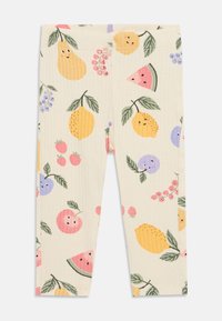 Bomull leggings med en lys kremfarge og ribbestruktur, prydet med fargerike fruktmønstre inkludert sitroner, jordbær og vannmeloner.