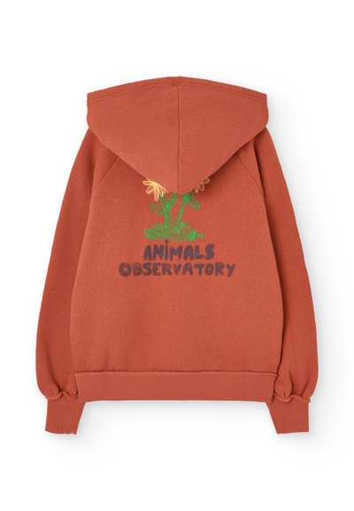 Ruda bluza z kapturem o miękkiej fakturze, z kwiatowym wzorem w zieleni i żółci oraz napisem "ANIMALS OBSERVATORY" w ciemnym niebieskim.