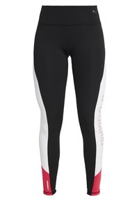 Czarne legginsy sportowe z białymi i czerwonymi akcentami, z wysokim stanem i bocznym logo, wykonane z elastycznego, dopasowanego materiału.