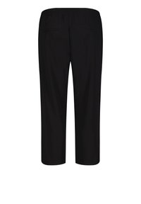 Czarne spodnie o luźnym kroju, z elastycznym paskiem w talii i dwiema tylne kieszeniami. Tkanina wydaje się gładka i ma lekki design.