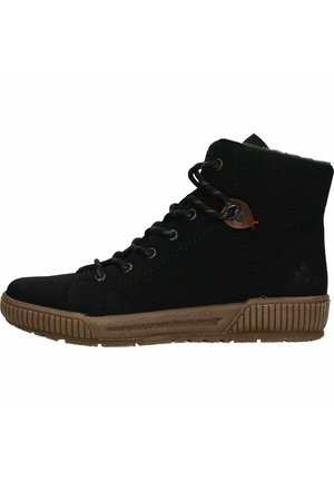 Black suede high-top shoe with textile lining, broad brown rubber sole, circular hardware accent, and contrasting stitching detail.