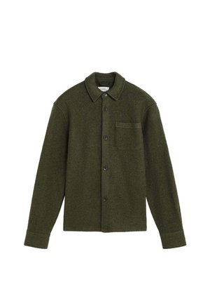 Donkergroene wollen jasje met knopen, een kraag, lange mouwen en een enkele borstzak aan de linkerkant.