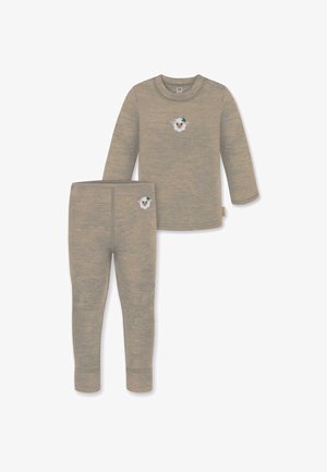 Tan long-sleeve top and matching leggings in soft fabric, featuring a sheep graphic with a clover on the chest and thigh.