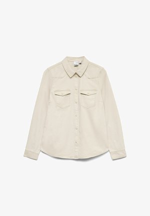 Camisa de manga larga color beige claro con cuello estructurado, dos bolsillos en el pecho y cierre de botones al frente. Confeccionada en algodón suave y texturizado.