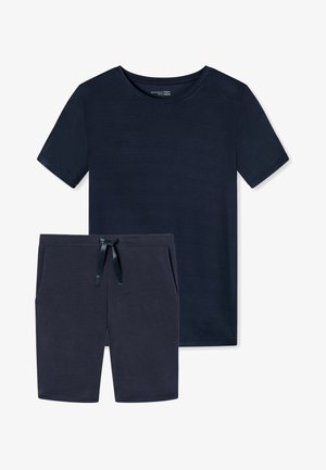 T-shirt bleu marine à manches courtes et short assorti, tous deux en tissu doux et lisse avec une coupe décontractée. Le short possède une taille élastique avec cordon de serrage.