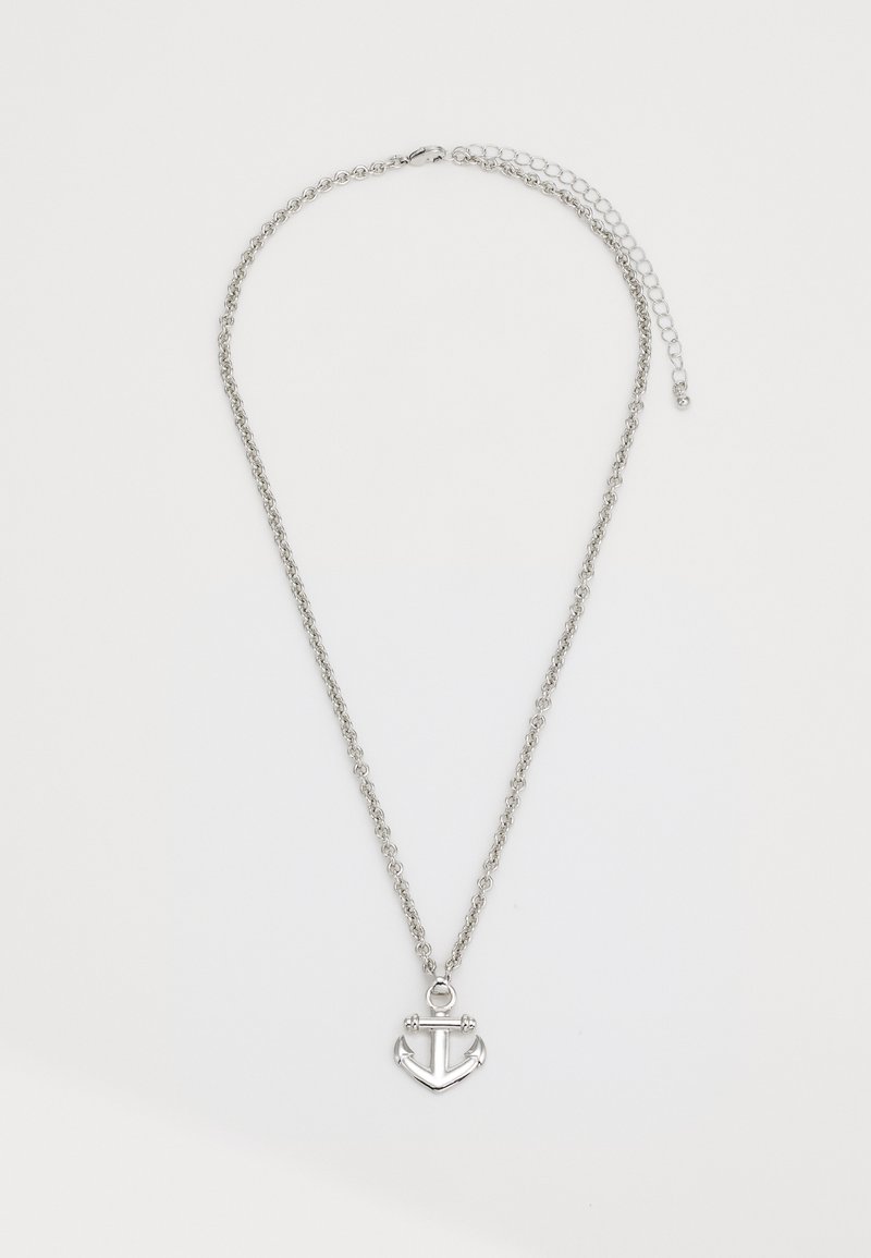 Silver chain necklace featuring an anchor pendant, with a polished finish and a delicate link design, suitable for casual wear.