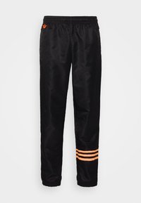 adidas Originals Pantalon de surv??tement - black/orange/noir - ZALANDO.CH