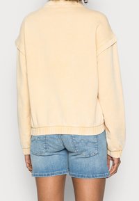 Roxy Sudadera - ochre