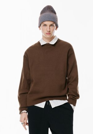 - Sweter
