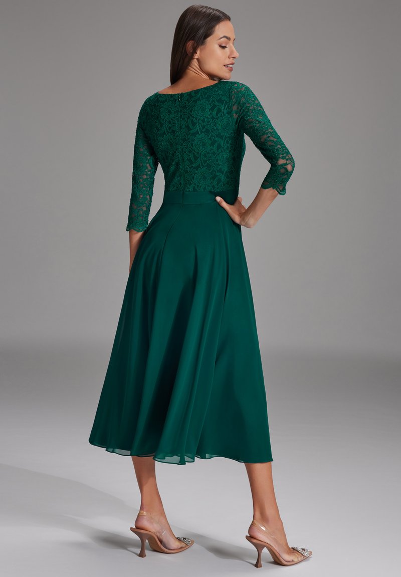 emerald green dress uk SS26 Mercury midi dress in emerald green T2 – Atom Label main image 1