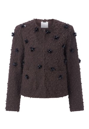 Veste marron texturée avec un col rond et des manches longues, ornée de motifs floraux noirs sur l'ensemble du tissu. Fermeture à glissière.