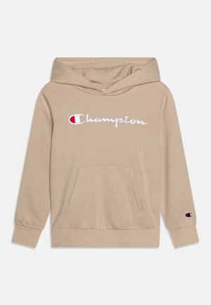 Felpa con cappuccio beige realizzata in morbido tessuto, con tasca frontale, polsini a costine e logo "Champion" ricamato con dettagli a contrasto.