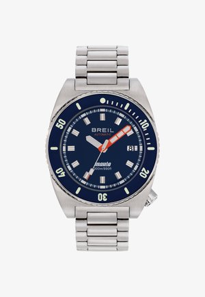 Automatisk ur i rustfrit stål med en mørkeblå urskive, lysende markeringer, orange sekundviser og datovisning. Vandresistant op til 300 m.