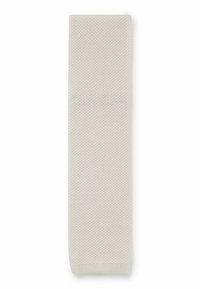 Sciarpa lavorata a maglia beige con un motivo testurizzato, forma rettangolare e bordi rifiniti, lunga circa 150 cm.