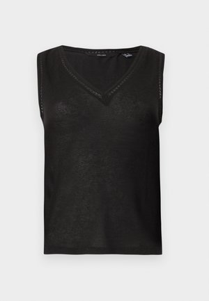 Haut noir sans manches en maille avec col en V et bordure délicate en dentelle le long de l'encolure et des emmanchures sur fond gris clair.