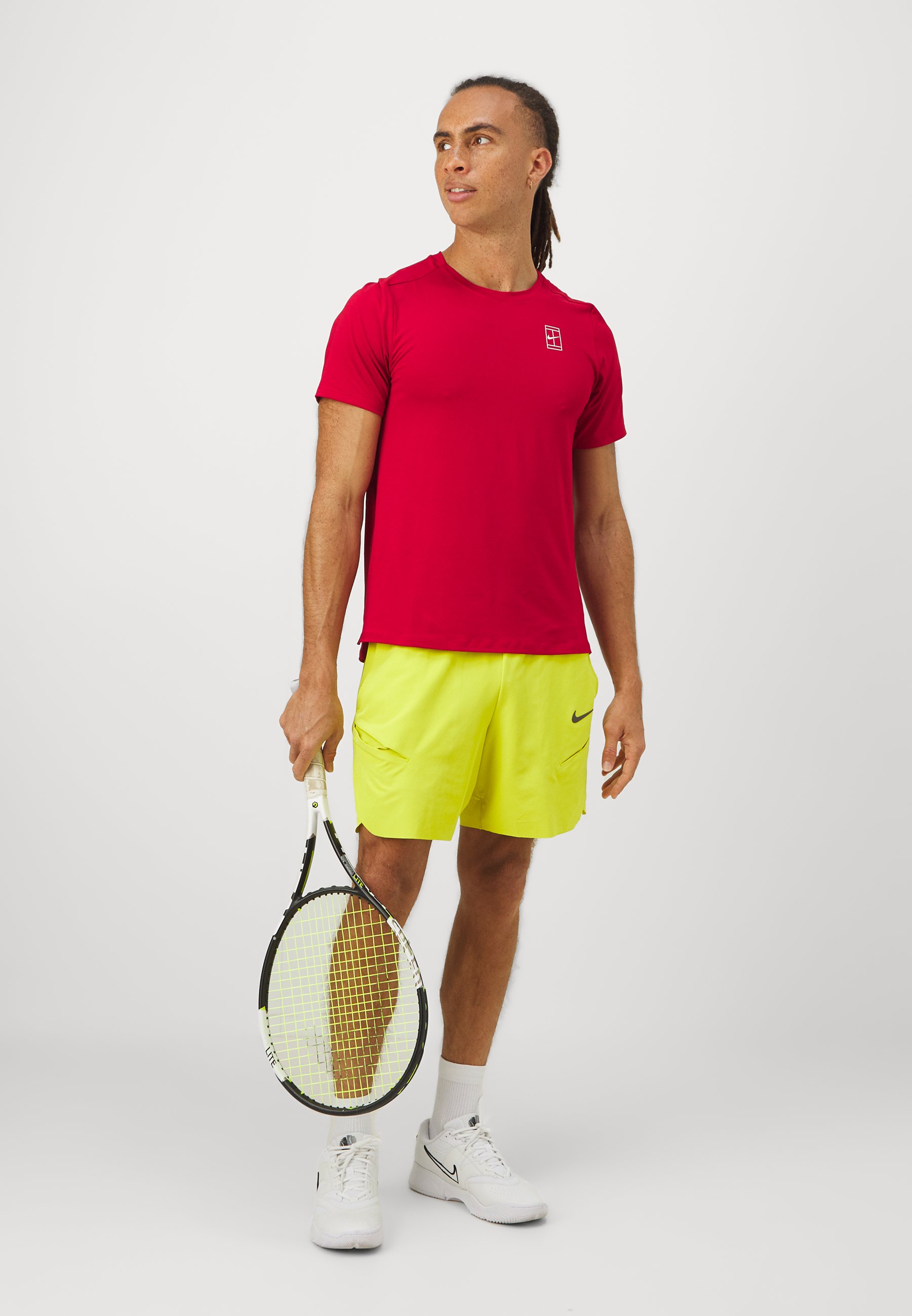 green red and yellow nike shorts