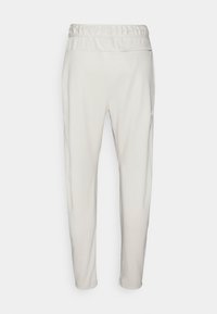 Jordan WARMUP PANT - Calças de fato de treino - light orewood