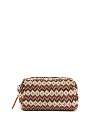 Zippered cosmetic bag made of woven fabric featuring a zigzag pattern in red, green, cream, and black. Rectangular shape with leather accent.